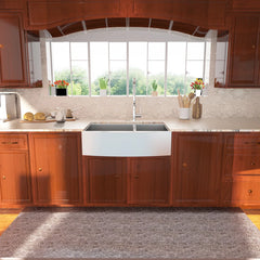 Lordear Modern kitchen with wooden cabinets, a white farmhouse sink, and large windows.