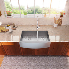 Lordear Stainless steel kitchen sink in a modern kitchen with wooden cabinets and large windows.