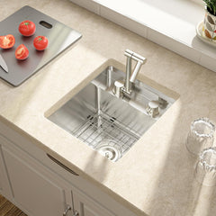 Lordear Stainless steel kitchen sink on a countertop with tomatoes and a cutting board.
