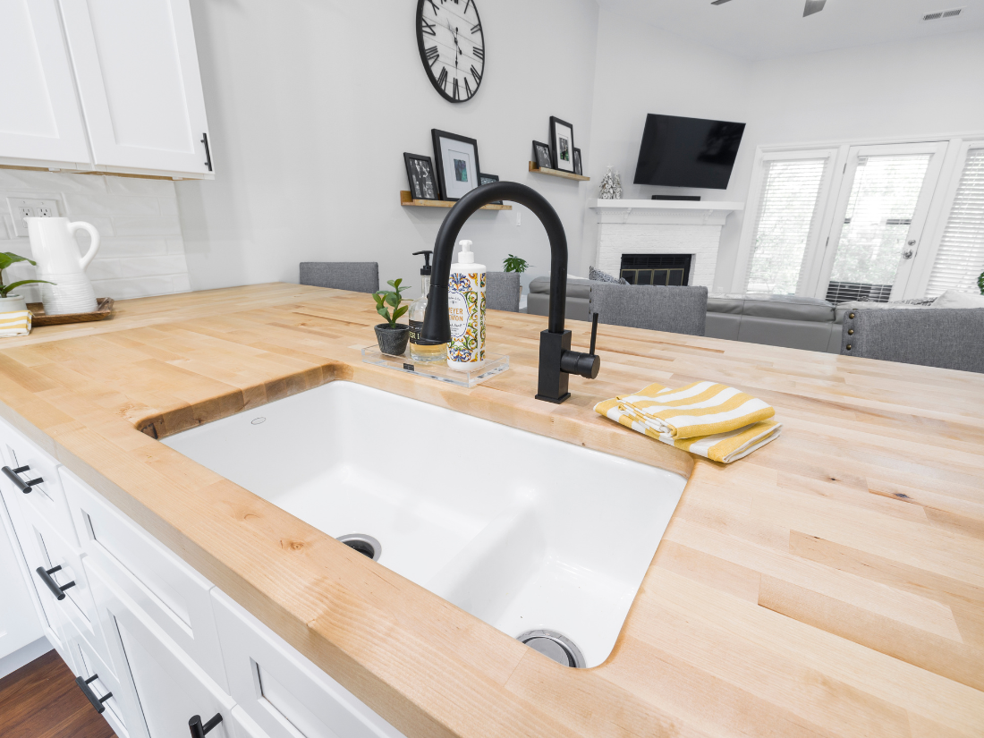 Why Are Kitchen Sink Drains Always Placed at the Bottom?