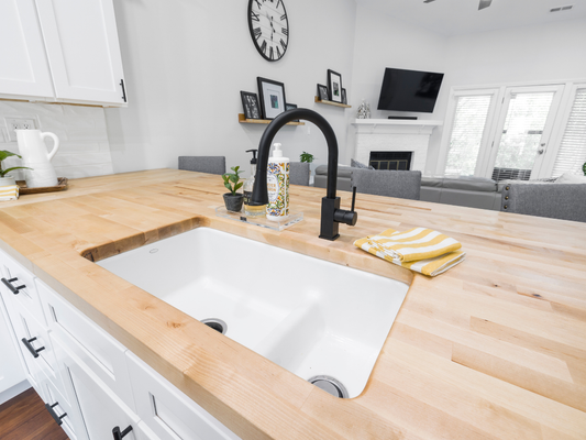 Why Are Kitchen Sink Drains Always Placed at the Bottom?